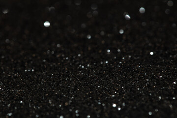 Black glitter textured patterned background