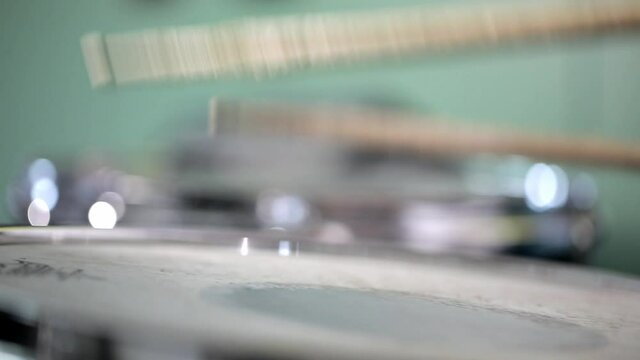 Closeup shot of drummer playing bass drum