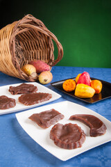 Prickly pears and sicilian mostarda on a table with a wicker basket