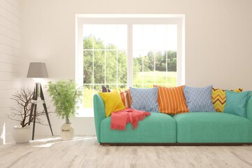 White living room with sofa and summer landscape in window. Scandinavian interior design. 3D illustration