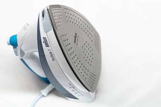 Lviv, Ukraine - November 10, 2020: Braun TexStyle 7 steam iron on white background