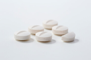 Five and a half tablets on a white background