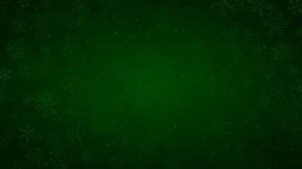 Christmas background of snowflakes of different shapes, sizes and transparency in dark green colors