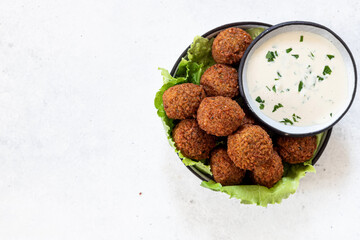 Traditional homemade chickpea Falafel  balls  with tahini sauce