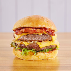 Burger special on wood in high key