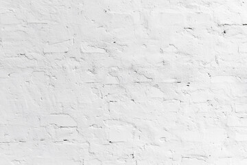 Fototapeta premium Texture of white wall of bricks and cement mortar