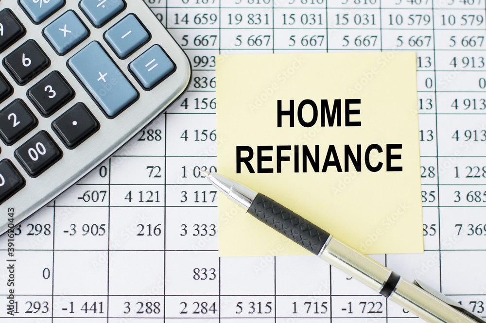 Poster on a desk calculator, pen and note paper with text home refinance on the numbers background