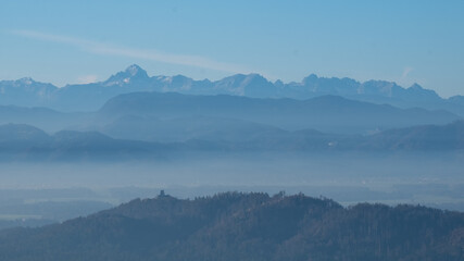 mystical scenery with layers of mountains in a beautiful landscape with hilltops softly peaking out...