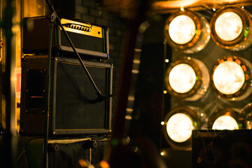 Electric guitar amplifier on club music stage