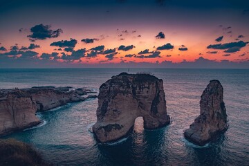 Lebanon, Beirut- Sunset over the Raouche Rocks - obrazy, fototapety, plakaty