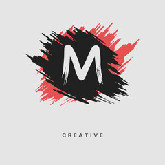 Hand drawn Letter M Logo on colorful brush strokes background. Initial white paint brush stroke letter M Logo Design. Creative template for logotype, emblem, monogram, jewelry, cosmetic or brand name.