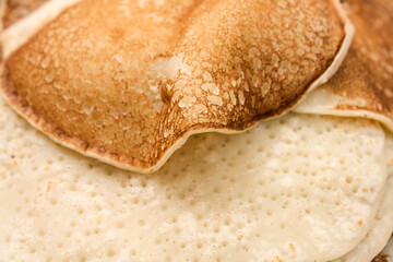 Fried thin pancakes made from wheat flour close up Photo