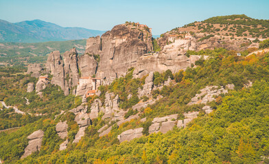 Beautiful panoramic view of the monasteries (Varlaam, Rousanou, St. Nicolaus, an Great Meteoron) of Meteora, Thessaly, Greece with spectacular unique rock formations