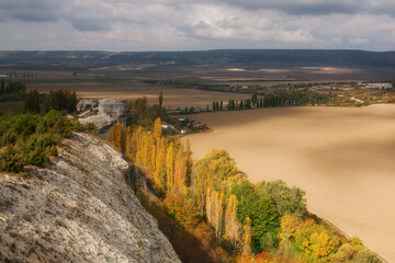 Fototapeta na wymiar Beautiful autumn landscape with mountains and forest. Bright colors of autumn. Crimea, Arman-Kaya mountain, Tankovoe village