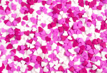 Pink and white hearts. Holiday background, top View. Concept February 14.