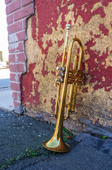 Obraz na płótnie Canvas Old Trumpet Brick Wall