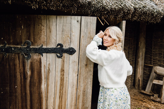 Woman With A Wooden Door