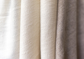 white and brown towel texture. Closeup natural cashmere scarf. brown texture background, close up of a fabric