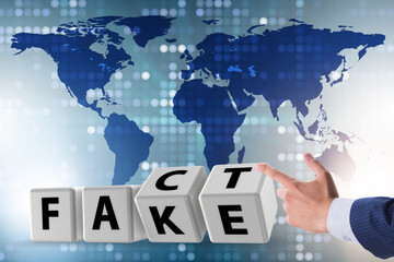 Face or fact concept with turning cubes