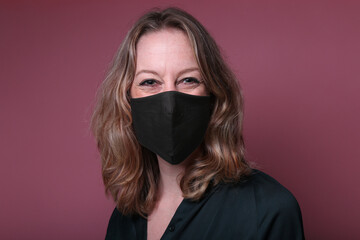 Beautiful woman wearing a mouth mask