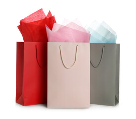 Gift bags with paper on white background