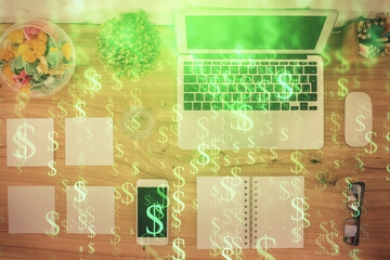 Stock market graph and top view computer on the table background. Multi exposure. Concept of financial education.