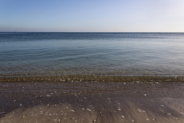 Fototapeta na wymiar Panoramic sea water view horizon with sand sky and empty beach Black sea coast 