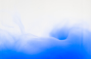 abstract blue background.
Abstract blue background with curl on white, close-up side view.