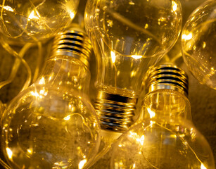 blurry background of a garland of lighted light bulbs