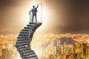 Concept of career ladder and door with businessman