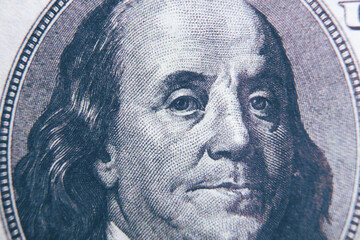 Benjamin Franklin's face on the 100 dollar bill