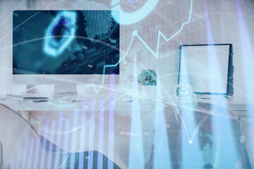 Multi exposure of stock market chart drawing and office interior background. Concept of financial analysis.
