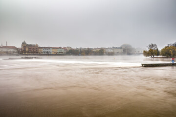 Fog over the Vltava river near Charles Bridge