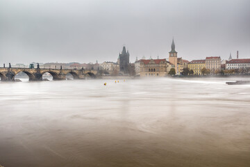 Fototapeta premium Fog over the Vltava river near Charles Bridge
