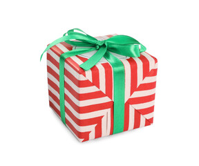 Christmas gift box decorated with green bow isolated on white