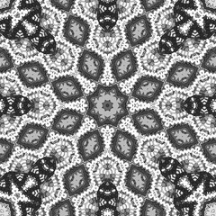 Seamless pattern with floral and mandala elements. Black and white decorative doodle background.