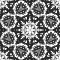Seamless pattern with floral and mandala elements. Black and white decorative doodle background.