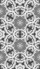 Seamless pattern with floral and mandala elements. Black and white decorative doodle background.