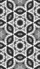 Seamless pattern with floral and mandala elements. Black and white decorative doodle background.
