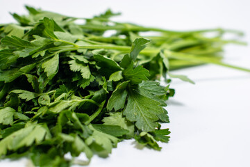 Bunch of fresh green parsley on a white background