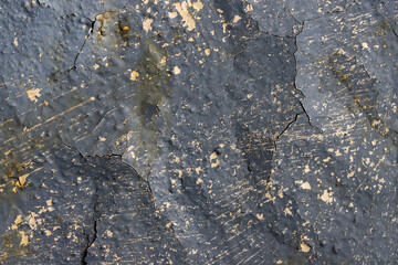 Peeling paint on the wall. Old rusty metal with cracked flaking enamel. Weathered rough painted surface with patterns of cracks and peeling. Grunge texture for background and design. High resolution.
