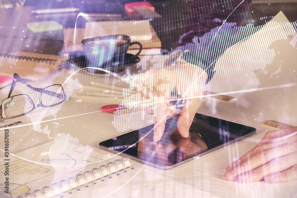Poster double exposure of man's hands holding and using a digital device and forex graph drawing. financial