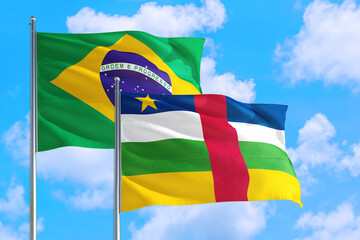 Chad and Brazil national flag waving in the windy deep blue sky. Diplomacy and international relations concept.