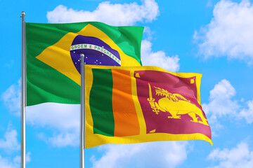 Sudan and Brazil national flag waving in the windy deep blue sky. Diplomacy and international relations concept.