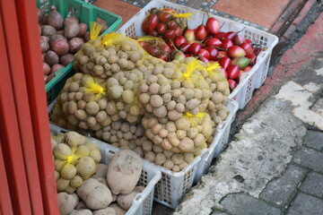 Fresh organic potato background in the market.