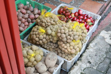 Fresh organic potato background in the market.