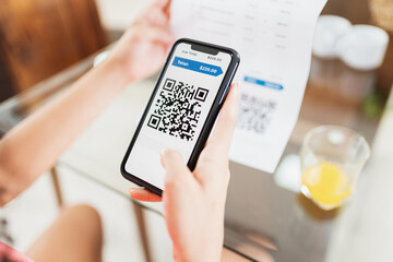 New form of payment of bills and bills in Brazil. Woman holding cell phone with pix app with QR-Code, x close-up of the screen.