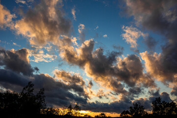 Obraz premium Landscape with blue sky and floating clouds 