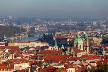 Fototapeta premium Autumn Prague City with colorful Trees from the Hill Petrin, Czech Republic