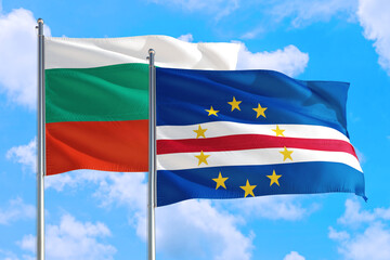 Cape Verde and Bulgaria national flag waving in the windy deep blue sky. Diplomacy and international relations concept.